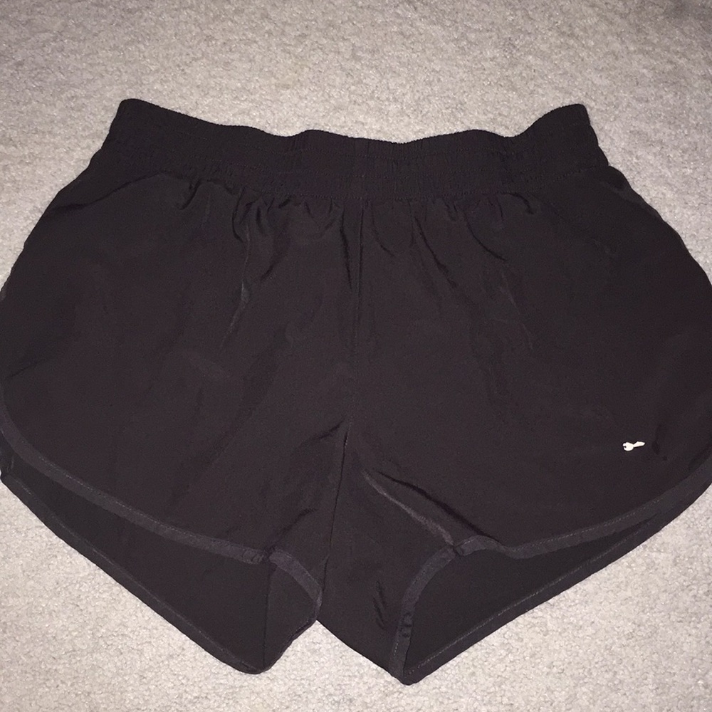 Puma black athletic workout shorts.